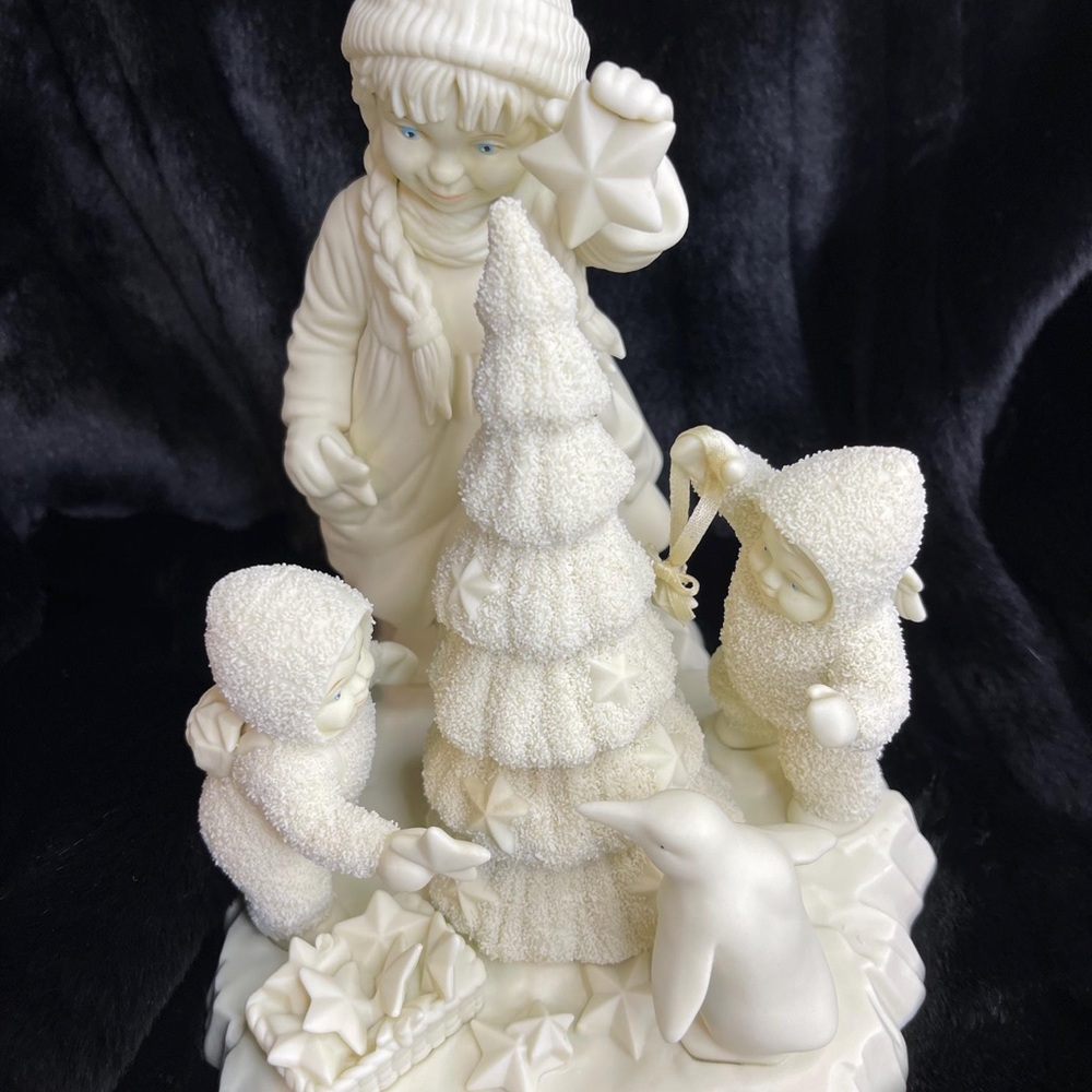 Charming Winter Figurine with Children and Penguin